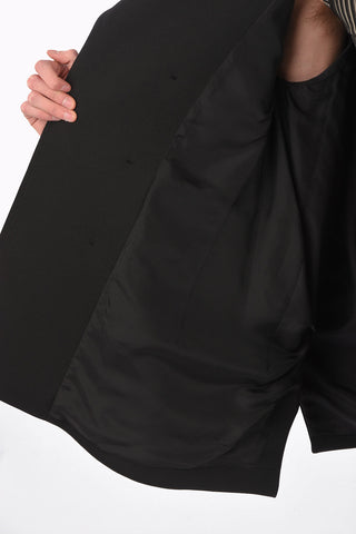 MM10 cappotto doppiopetto con tasche ad aletta