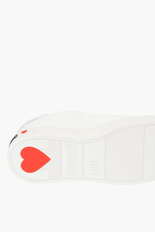 LOVE logo printed leather sneakers