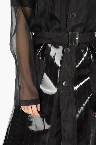 MM0 Accordion sheer raincoat with belt