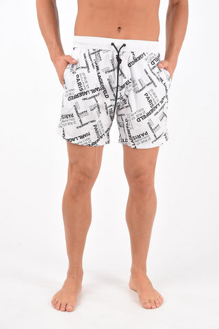 printed CARRY OVER - RUE ST.GUILL. swim shorts