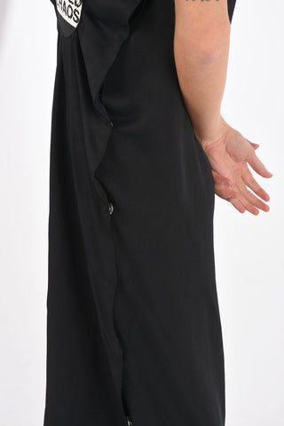 Vestito lungo senza maniche con patch e bottoni laterali