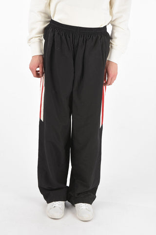 Pantaloni tracksuit oversize con elastico in vita