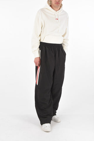 Pantaloni tracksuit oversize con elastico in vita