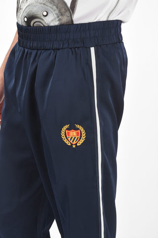 Embroidered track pants with elastic waist