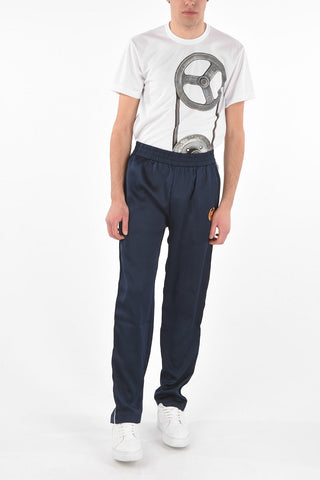 Embroidered track pants with elastic waist