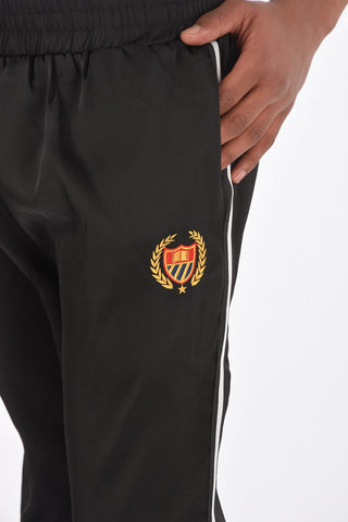 Pantaloni piping con coulisse in vita