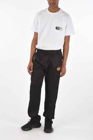 Pantaloni piping con coulisse in vita