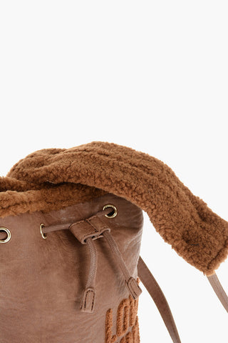 LOVE faux leather mini bucket bag with faux fur details