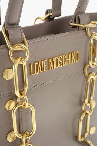 LOVE faux leather tote bag with studs