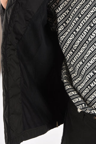 Windbreaker with leather details