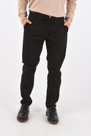 Pantaloni con coulisse e elastico in vita