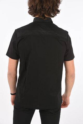 polo T-ORACLE in jersey con taschino