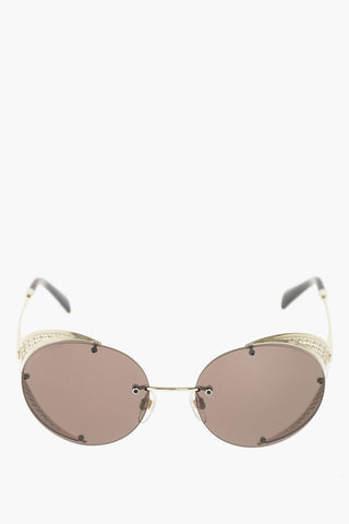 round sunglasses with perforated details