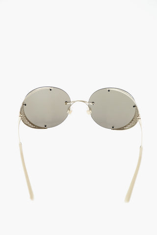 round sunglasses with perforated details