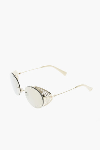round sunglasses with perforated details