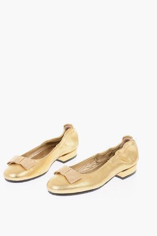 ballerine in pelle laminata con fiocco