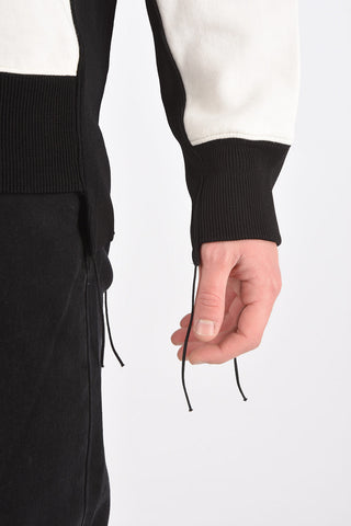 felpa girocollo asimmetrica con parti in maglia