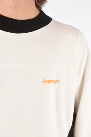 felpa girocollo asimmetrica con parti in maglia