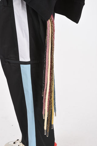 Felpa girocollo asimmetrica con multilacci