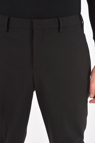pantalone slim fit con passanti
