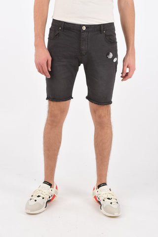 shorts in cotone stretch ad orlo sfrangiato con spille