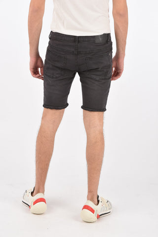 shorts in cotone stretch ad orlo sfrangiato con spille