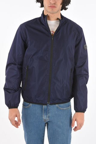 Giacca a vento con cappuccio e tasche zip