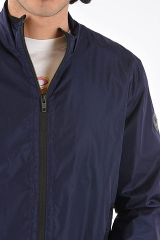 Giacca a vento con cappuccio e tasche zip