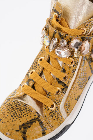 sneakers alte in pelle effetto pitone con castoni