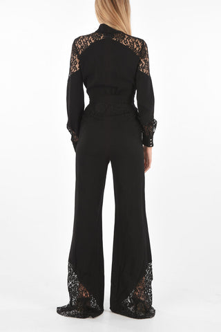 COUTURE EST.1978 jumpsuit con dettagli in pizzo e scollatura profonda