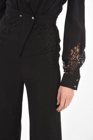 COUTURE EST.1978 jumpsuit con dettagli in pizzo e scollatura profonda