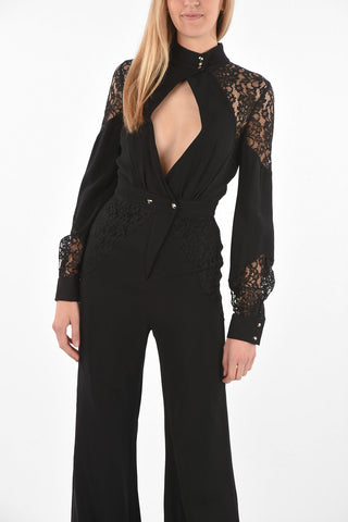 COUTURE EST.1978 jumpsuit con dettagli in pizzo e scollatura profonda