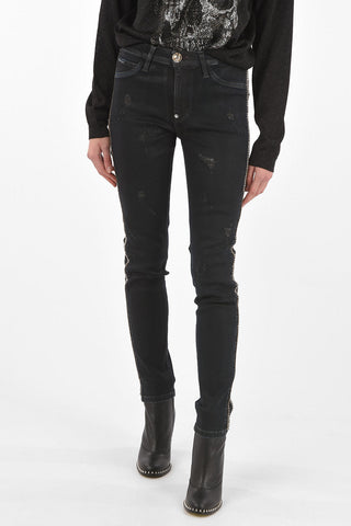 jeans distressed con profilo gioiello