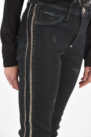 jeans distressed con profilo gioiello
