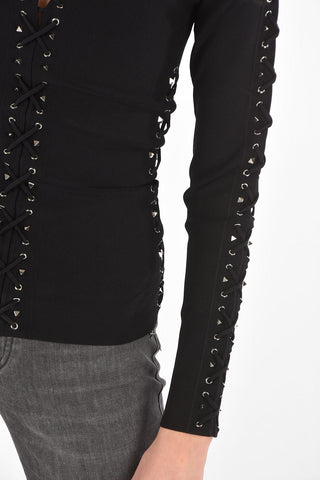 COUTURE EST.1978 top manica lunga lace up con borchie