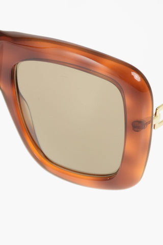 occhiali da sole oversized con montatura tartarugata