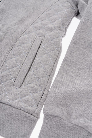 quilted sweatshirt with studs on the back