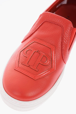 leather slip on sneakers with side studs