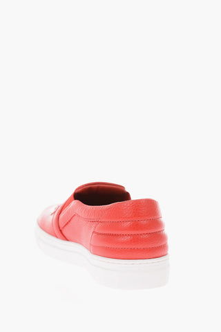 leather slip on sneakers with side studs