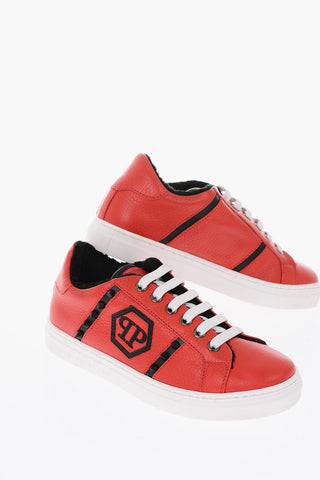 leather sneakers with side studs and faux fur inner