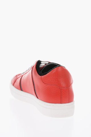 leather sneakers with side studs and faux fur inner