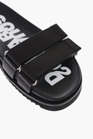 sandali in pelle con suola logata e chiusura in velcro