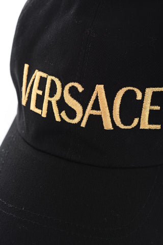 golden logo cap