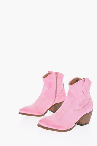 Texani in pelle con zip laterale