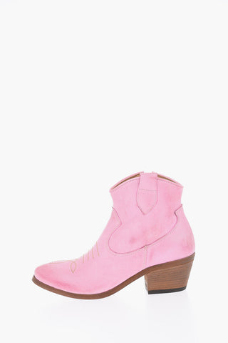 Texani in pelle con zip laterale