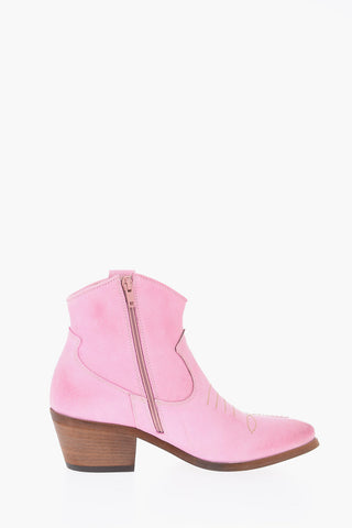 Texani in pelle con zip laterale