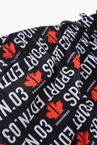 EDTN.03 all over logo printed swim shorts