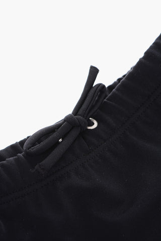 solid color MARFY swim brief with logo on the back