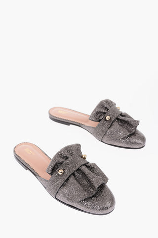 mules in pelle con dettaglio argentato