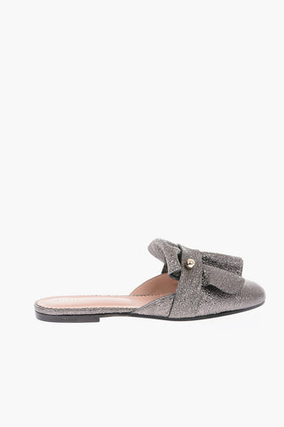 mules in pelle con dettaglio argentato